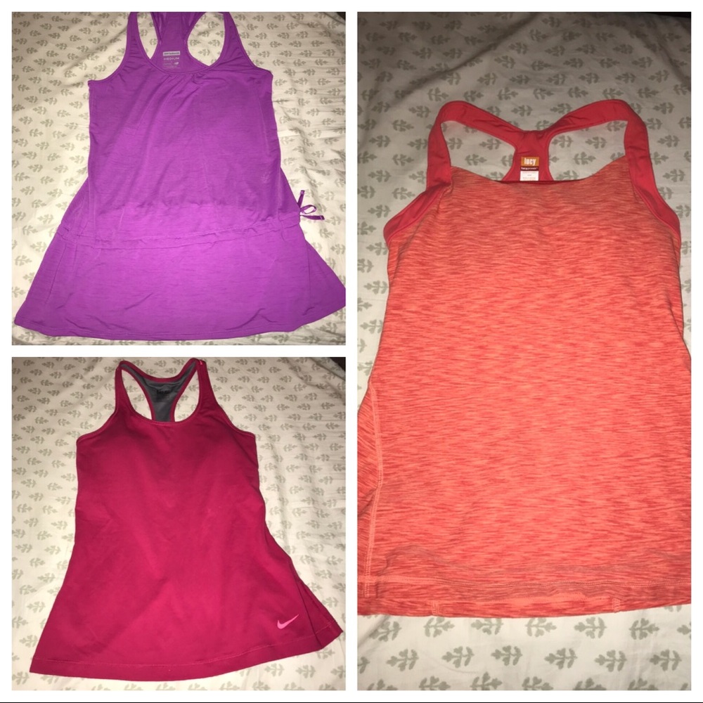 Three like new medium workout tanks